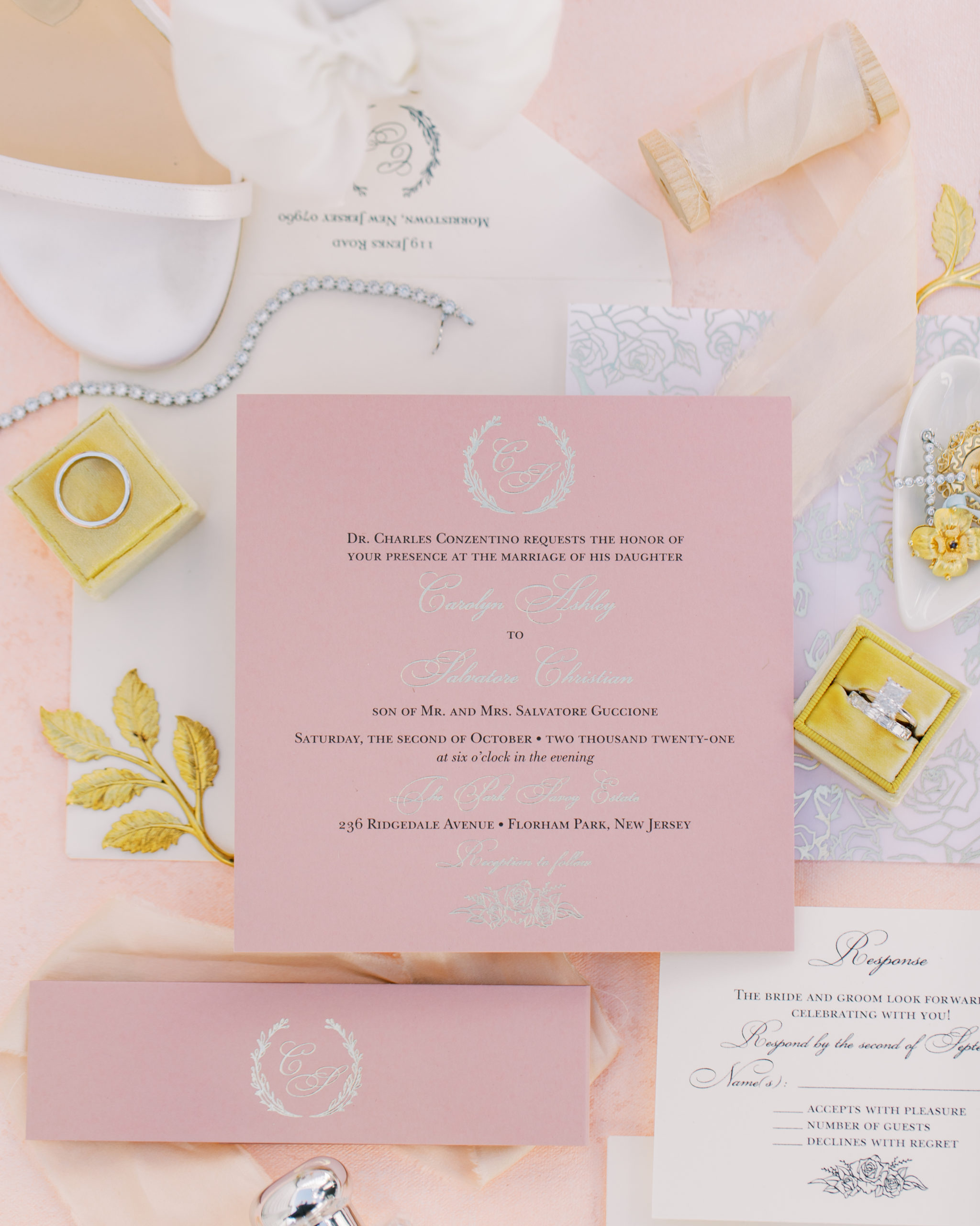 Invitation suite with pink invitation cards and personal details