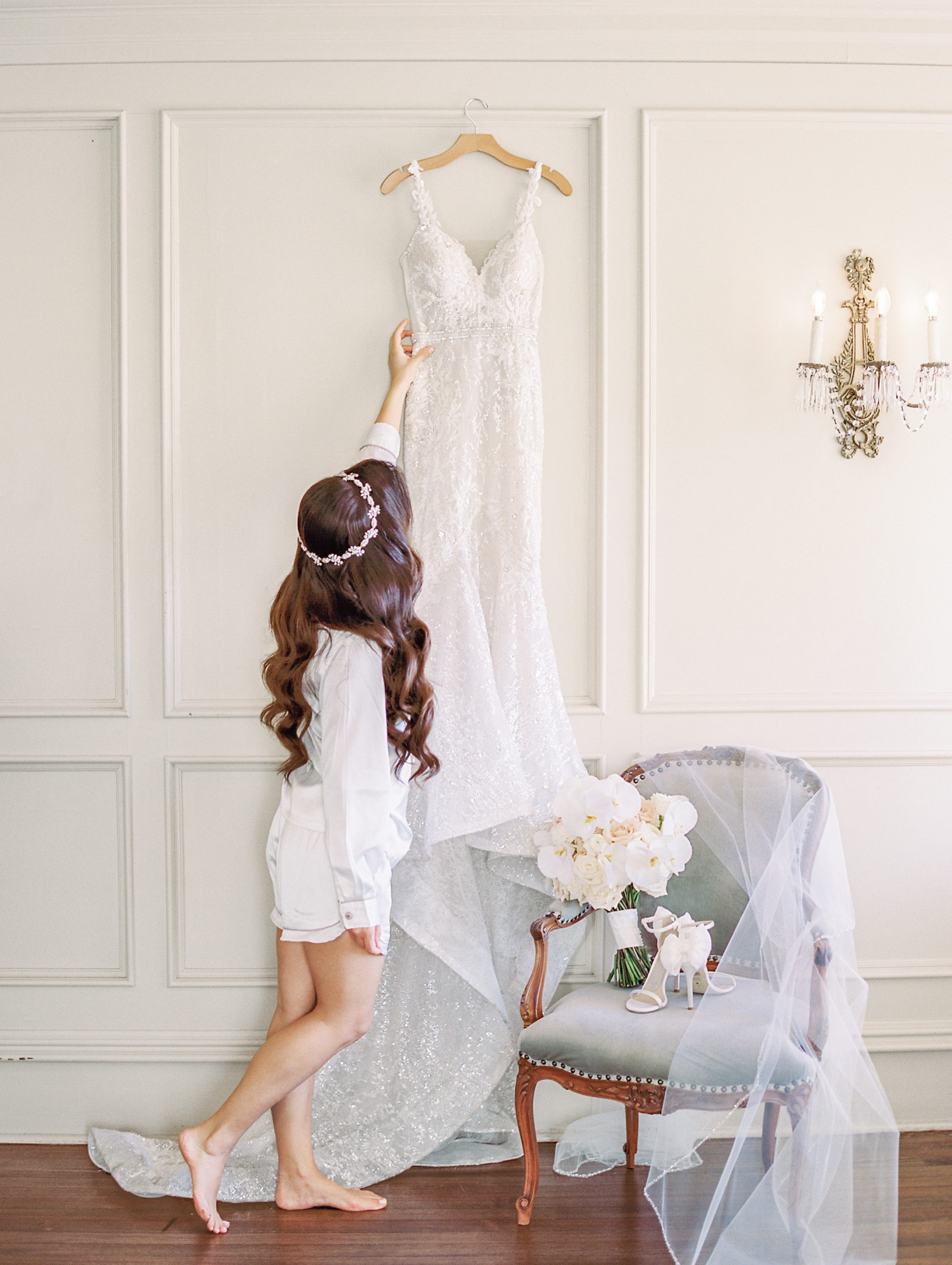 bride admiring berta wedding dress - Park Savoy Wedding Photography