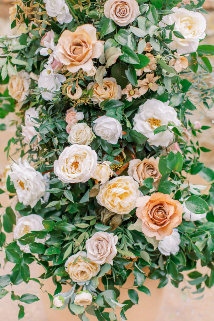 greenery with honey and mustard roses Bella Collina Wedding
