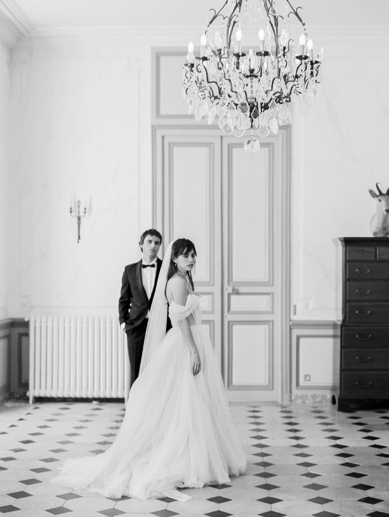 Bride and Groom in black and white portrait at french chateau wedding
