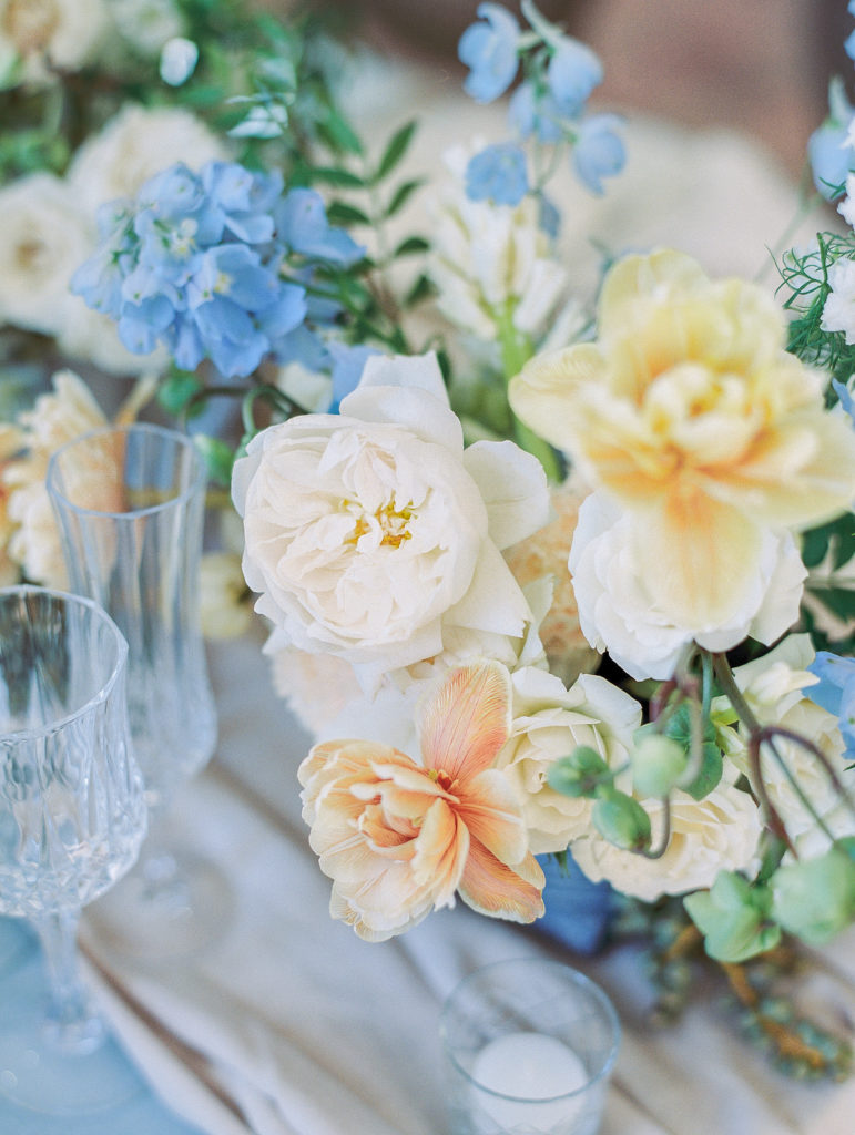 Garden roses and tulips at french chateau wedding reception