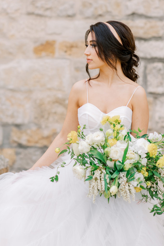 bride in fluffy tulle dress with large bouquet at italian villa Sunstone Winery Wedding Photography
