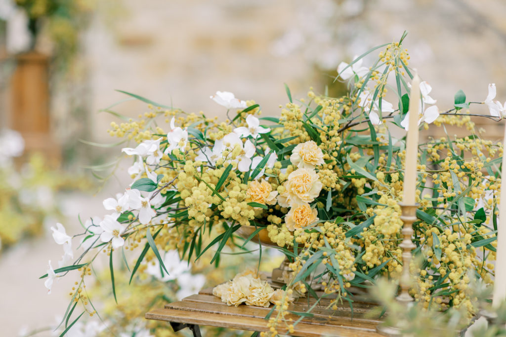gold and honey colored flowers in large arrangement at italian villa wedding