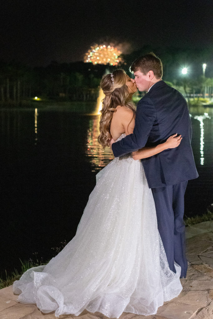 Bride and Groom Kiss during the fireworks