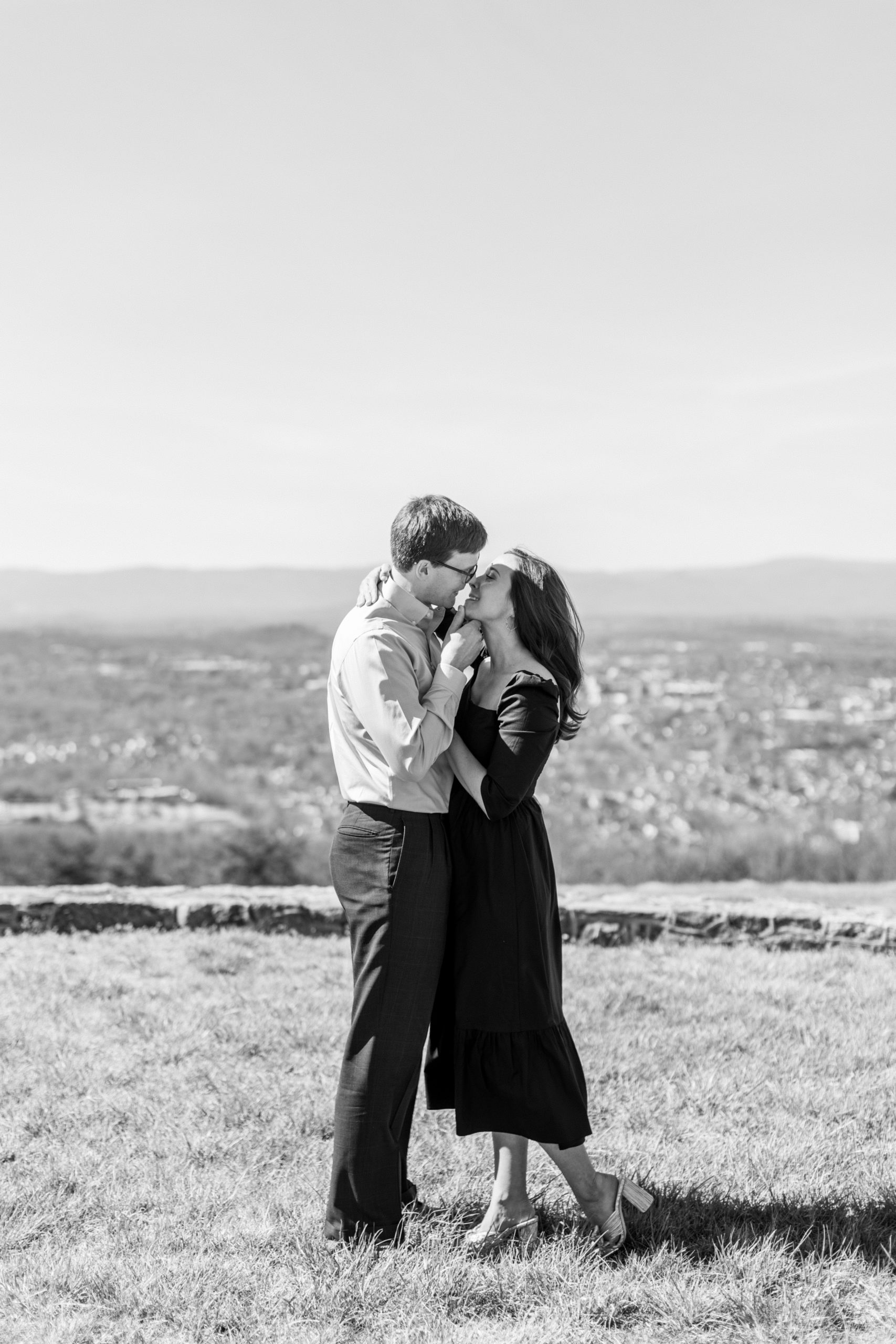 Spring at Montalto Engagement Session couple embraces on moutaintop