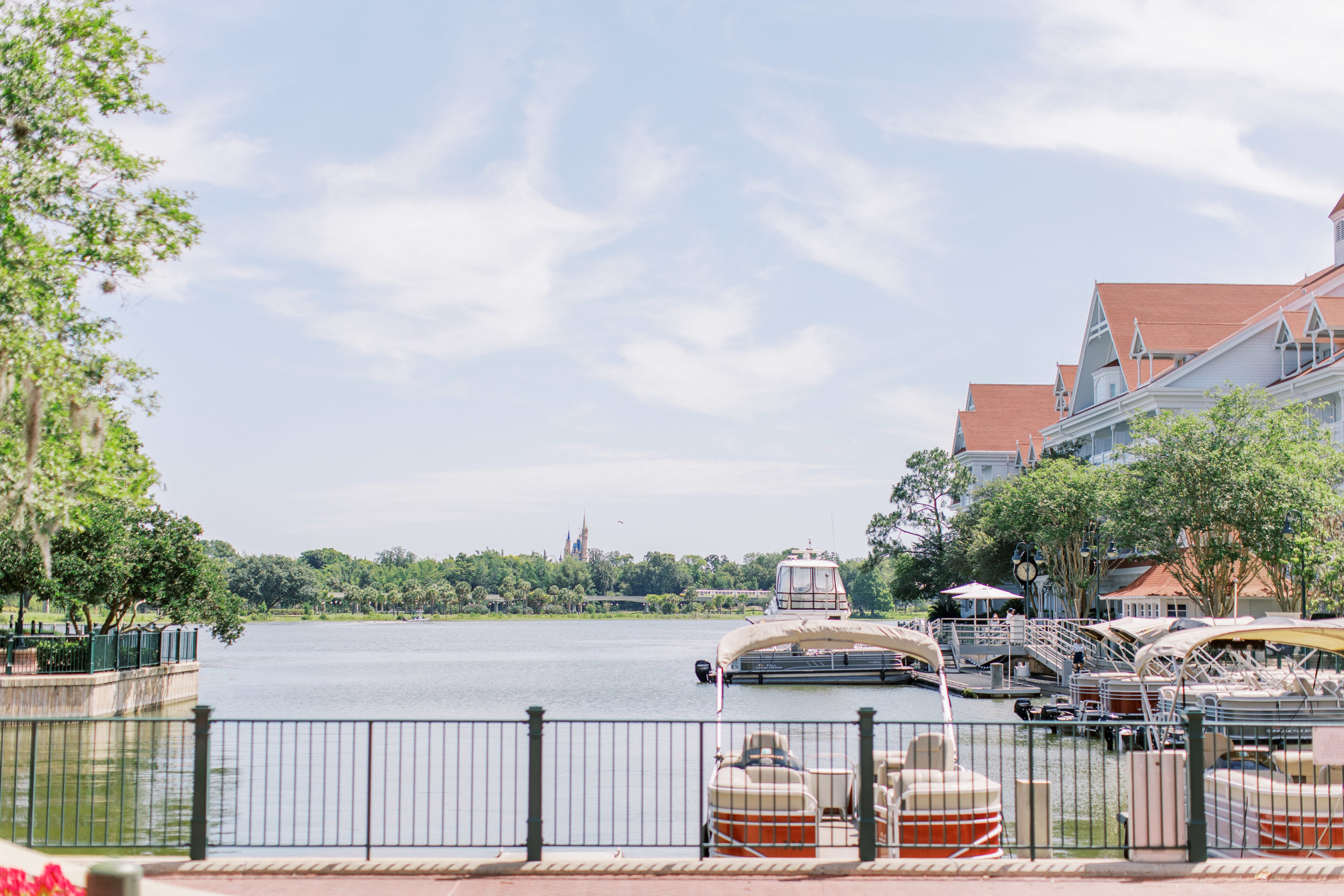 Boat docks in lake at Disney Resort for a Romantic and Timeless Grand Floridian Wedding 