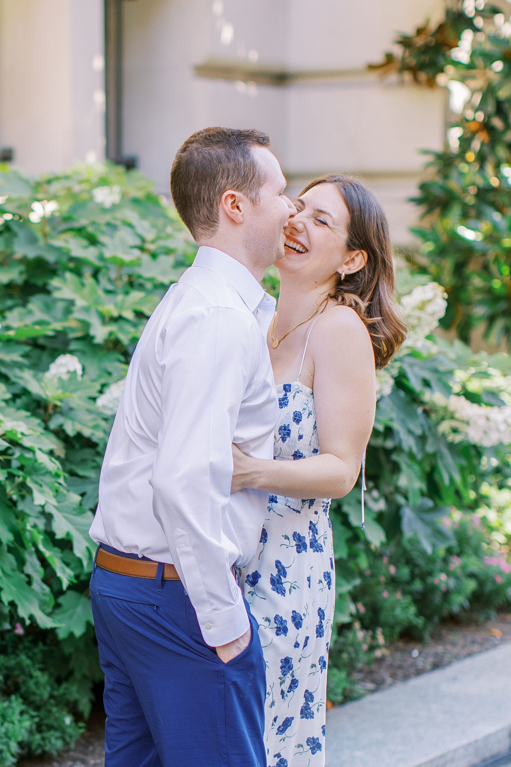 Couple embraces and laughs for Central Park Engagement Photos