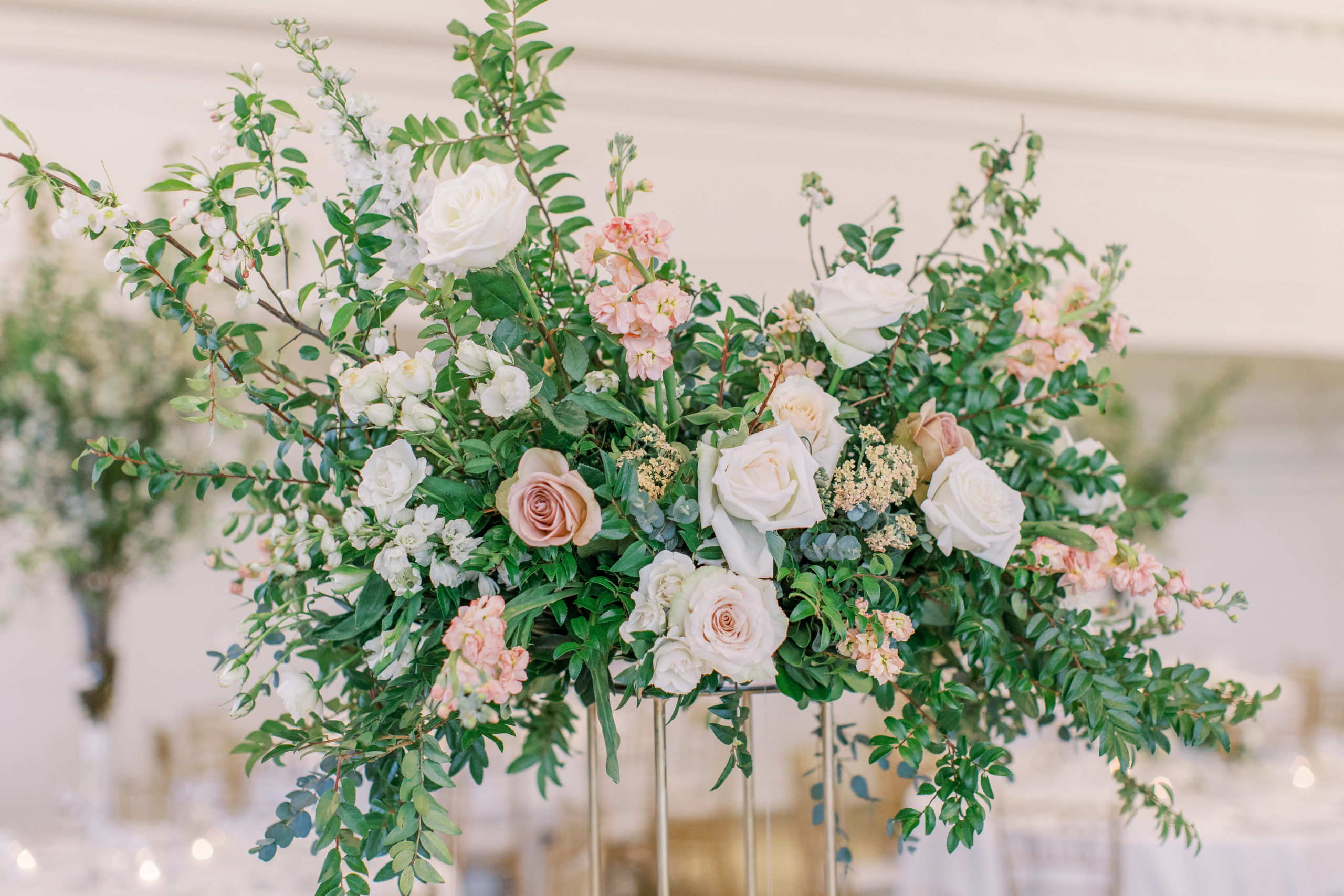 Peach and white rose centerpiece at wedding reception for a Romantic Park Chateau Wedding Photography