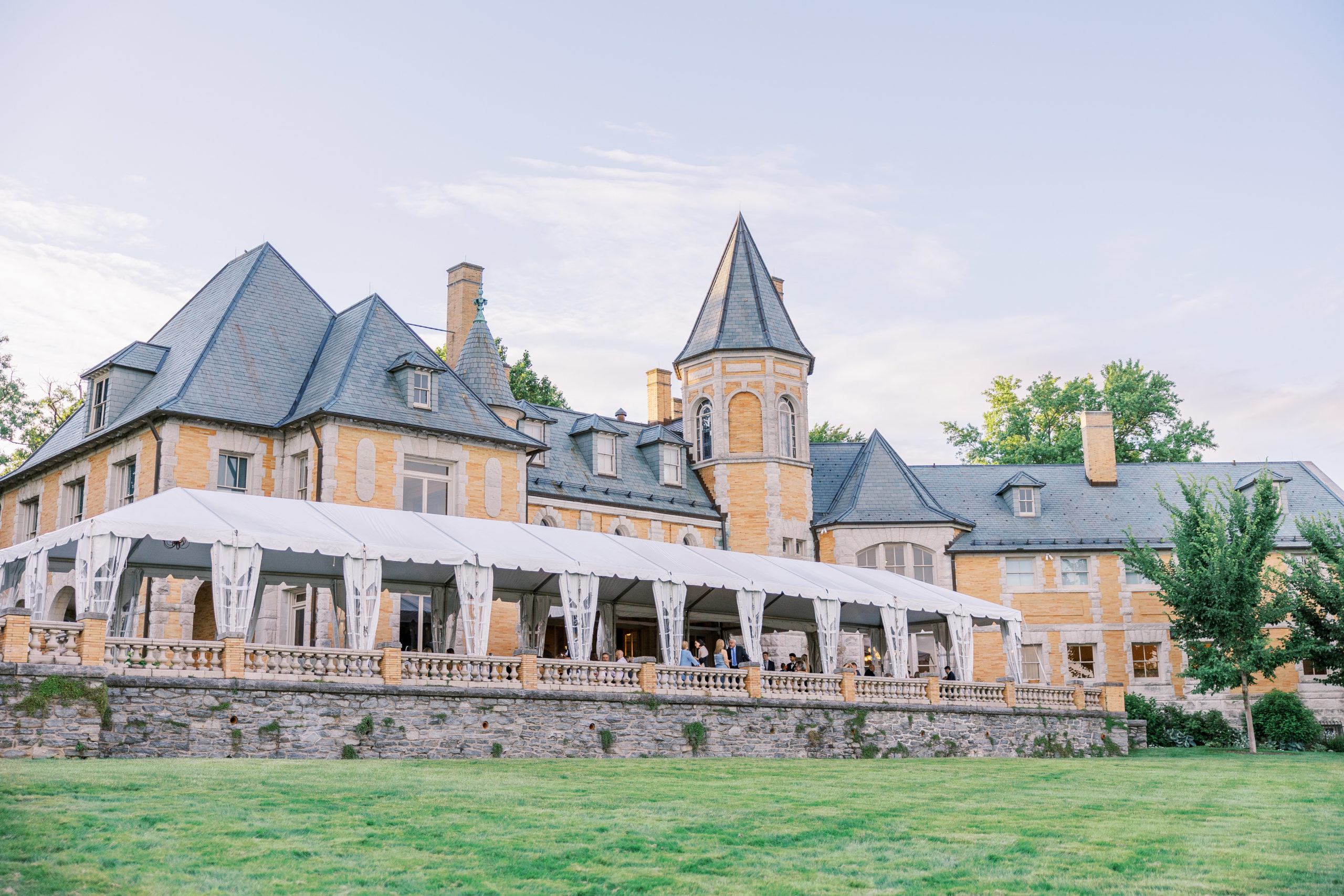 French chateau inspired estate of brick and limestone and tent for wedding for Cairnwood Estate Wedding Photography
