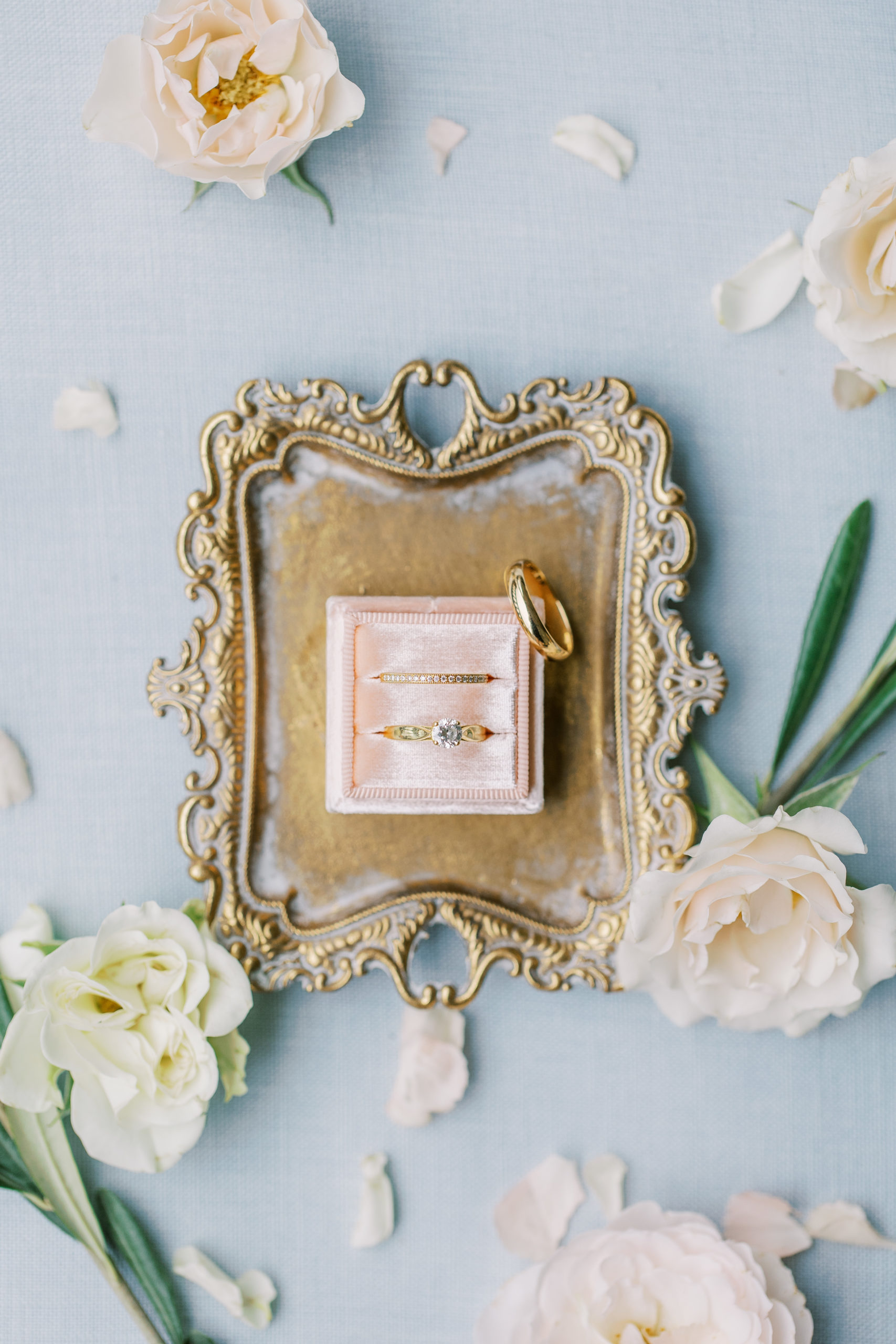 Light pink wedding box on gold tray with light pink and white roses at Cairnwood Estate Wedding Photography