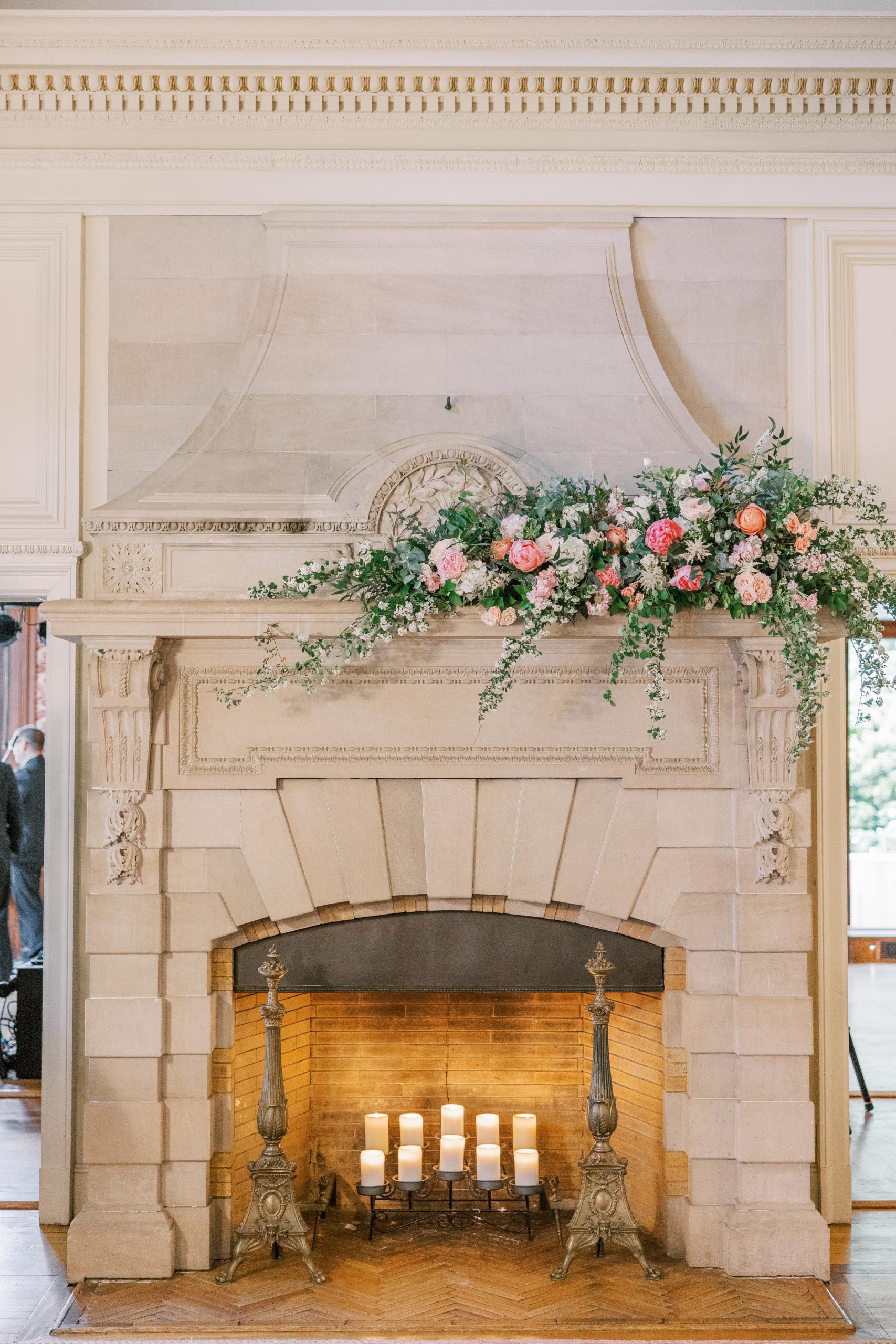 Stone fireplace with candles and roses at Cairnwood Estate Wedding Photography
