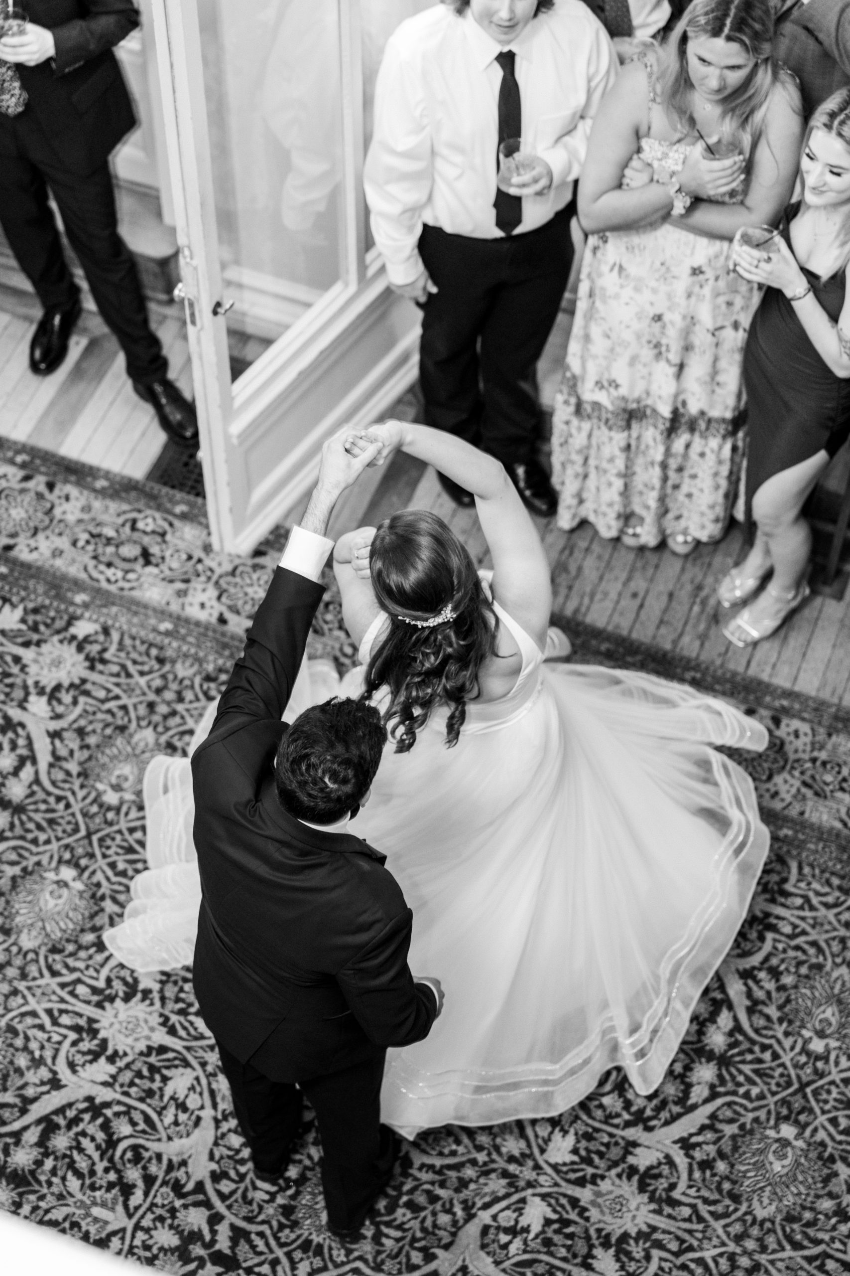 Groom spins bride at wedding reception for Cairnwood Estate Wedding Photography