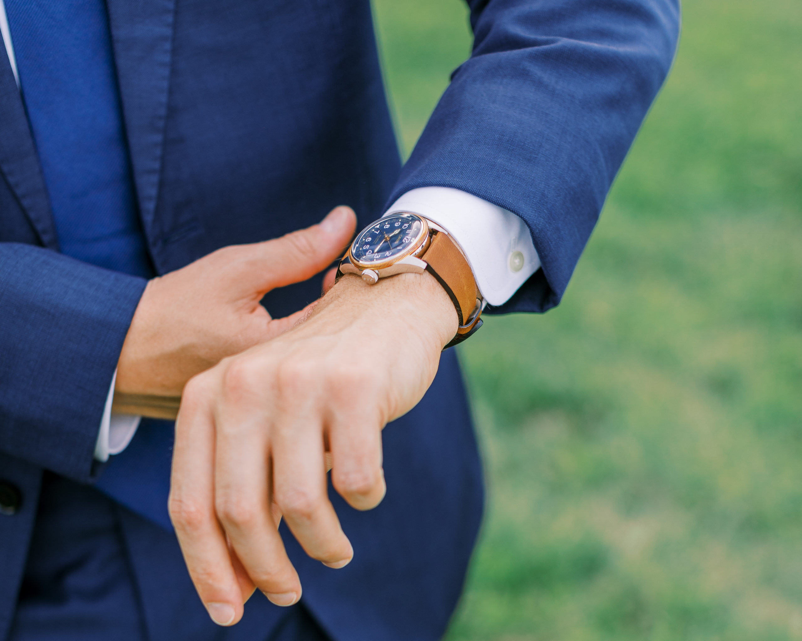 Groom adjusts his watch for Charlottesville Wedding Photography
