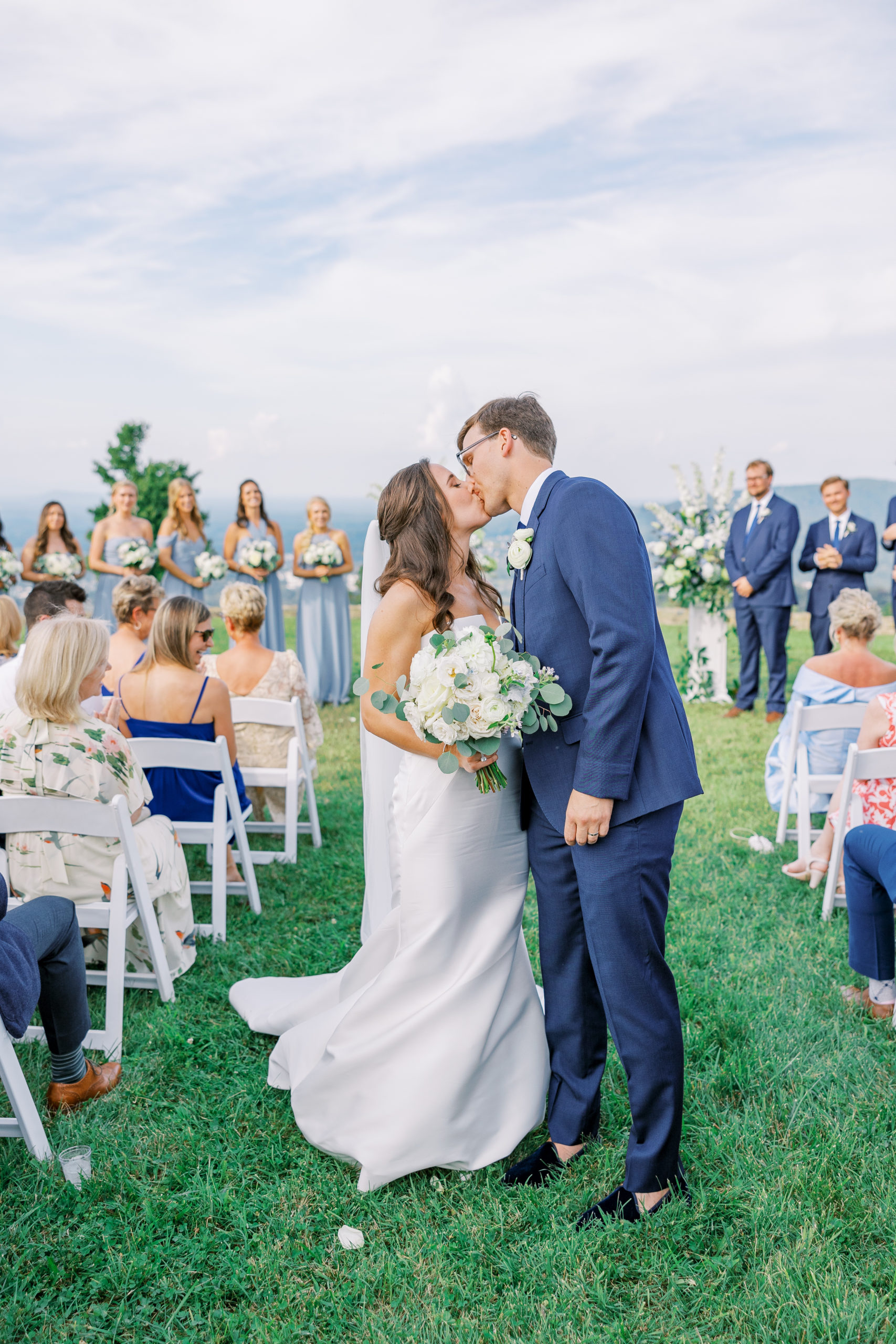 Bride and groom share a kiss after they are just married 
