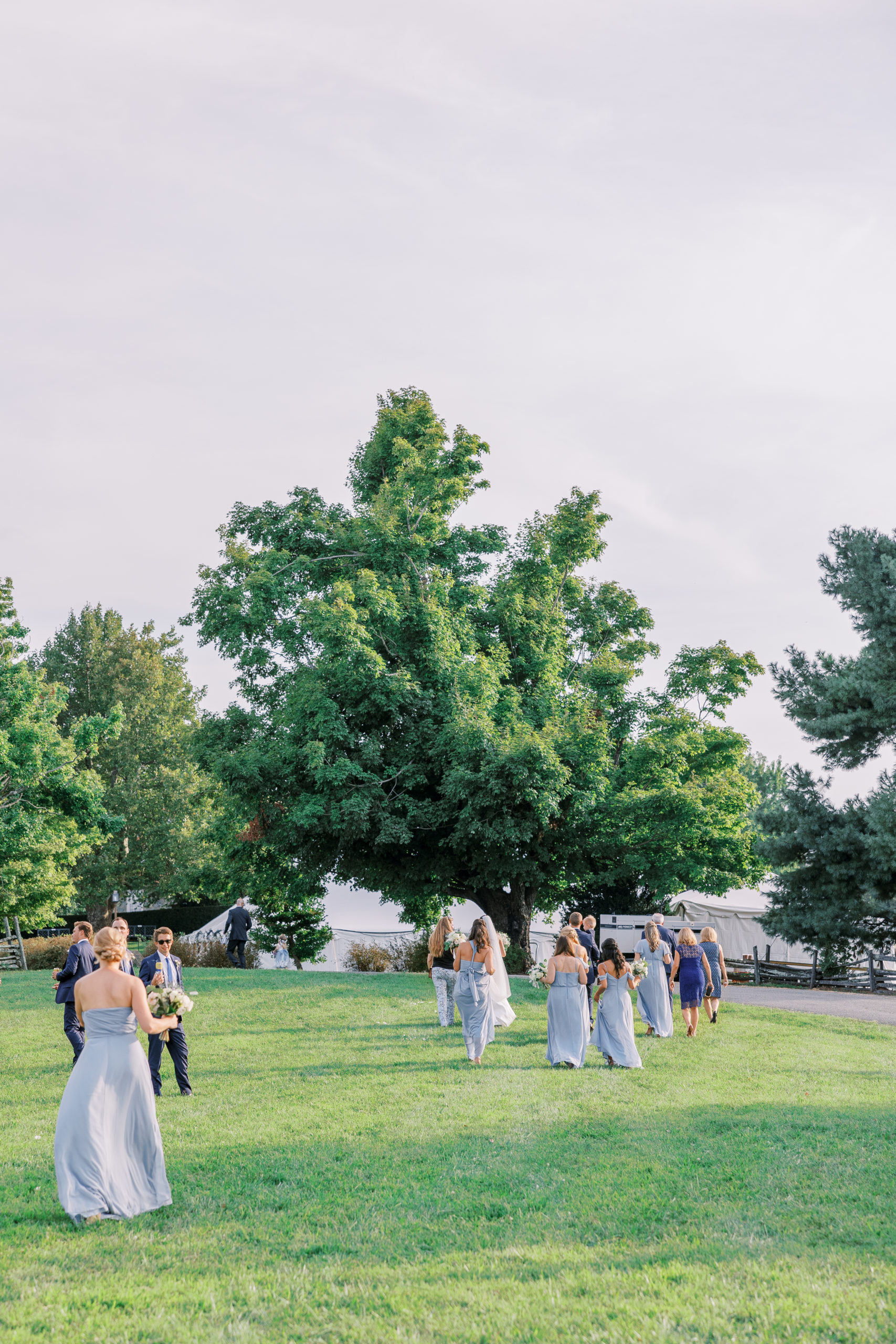 Bridal party walks toward wedding reception for Charlottesville Wedding Photography
