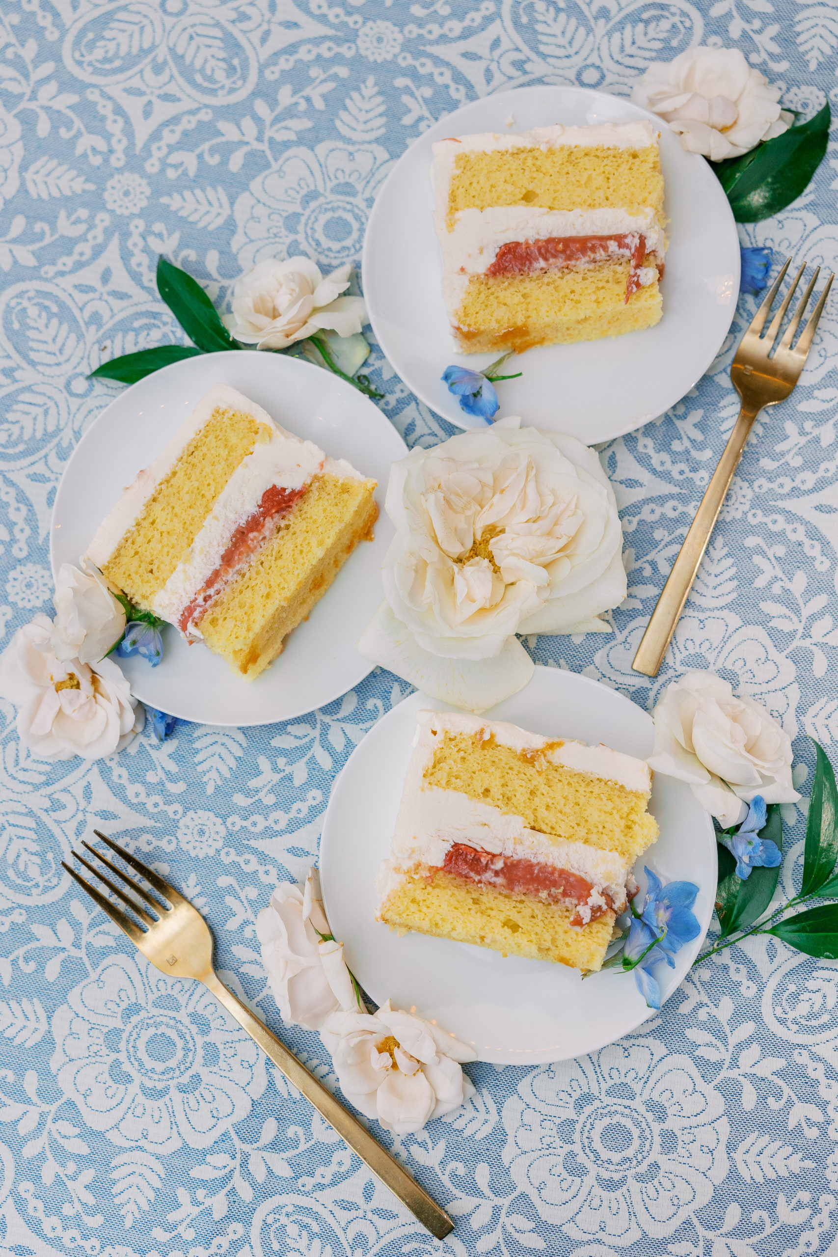 Slices of wedding cake with cream and fruit inside for Charlottesville Wedding Photography

