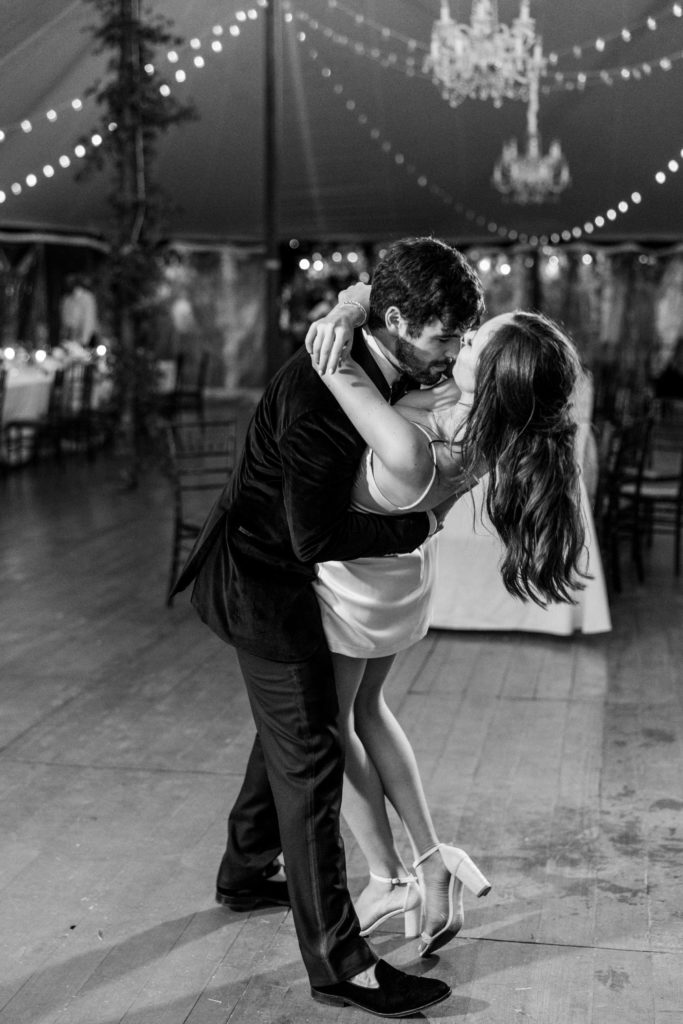 Bride and groom share a last and private dance on the dance floor at reception for Clifton wedding photography