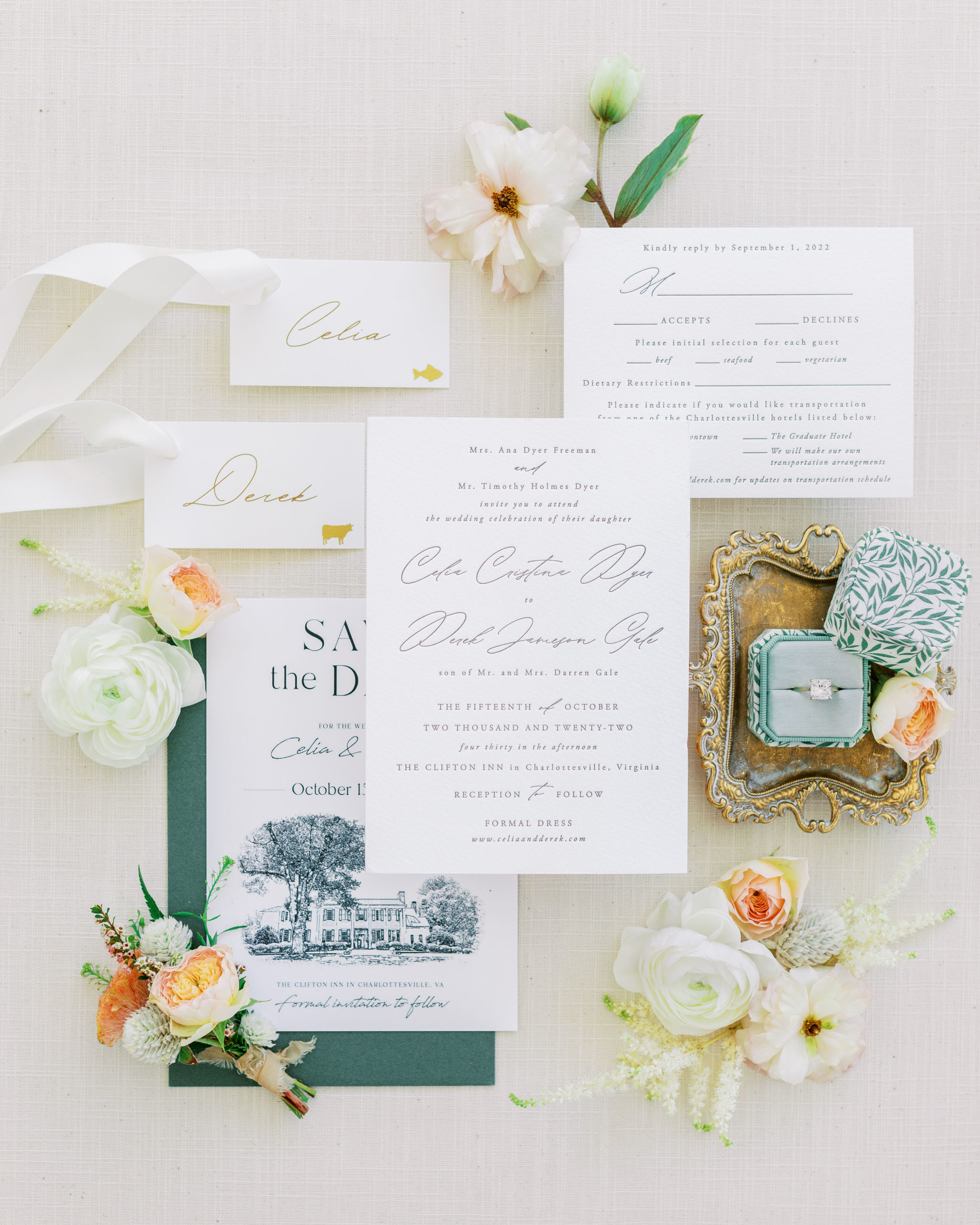 Cream invitation flat layout with white flowers and green ring box and gold tray for Clifton wedding photography