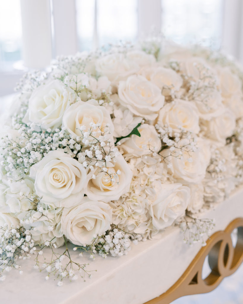 Large arrangement of white roses for the altar for California Grill Wedding
