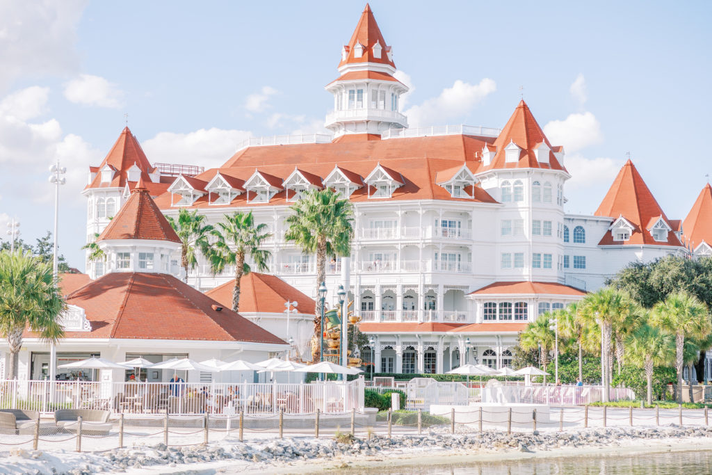 White and orange beach resort with palm trees at Disney in Florida 