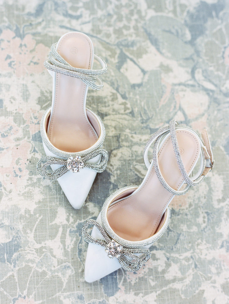 White heels with sparkled bow 