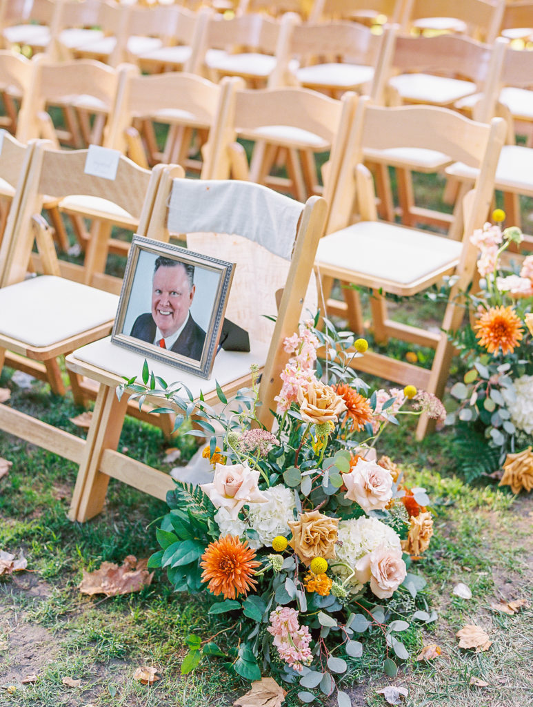 Portrait of passed loved one on the first chair for wedding ceremony for philadelphia wedding photographer