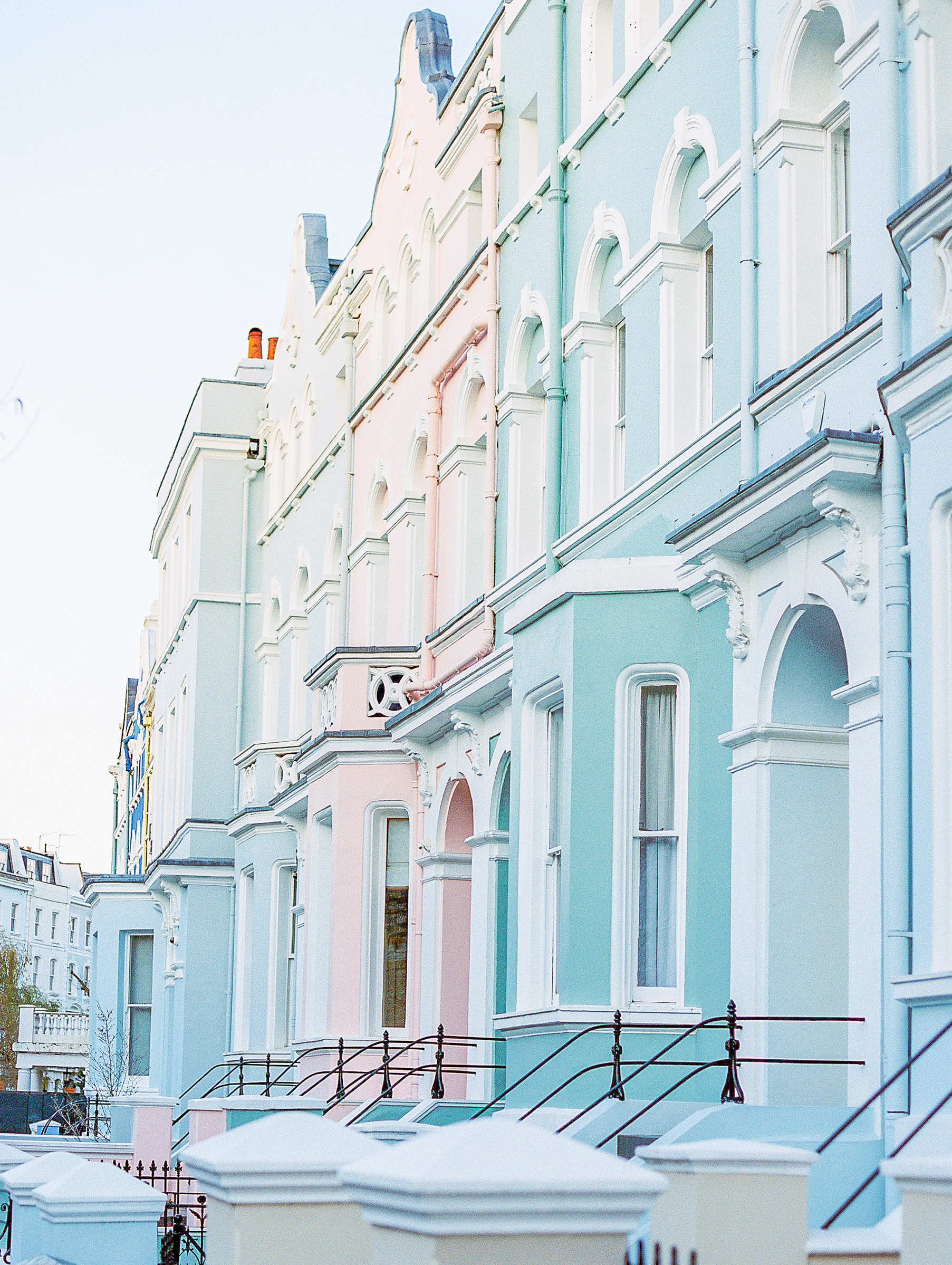 Spring in London Travel Blog by Destination Wedding Photographer Katie Trauffer - Notting Hill pastel colored row homes