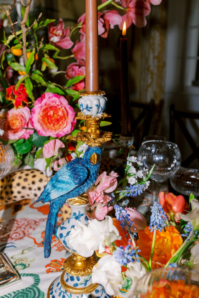 Lowdnes Grove Wedding by destination film wedding photographer Katie Trauffer Photography - close up detail of vibrant jungle inspired table design
