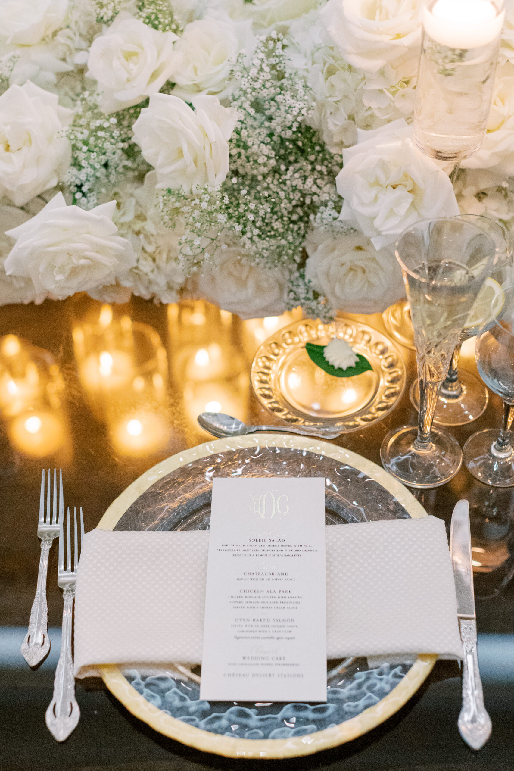 elegant white and gold reception table setting