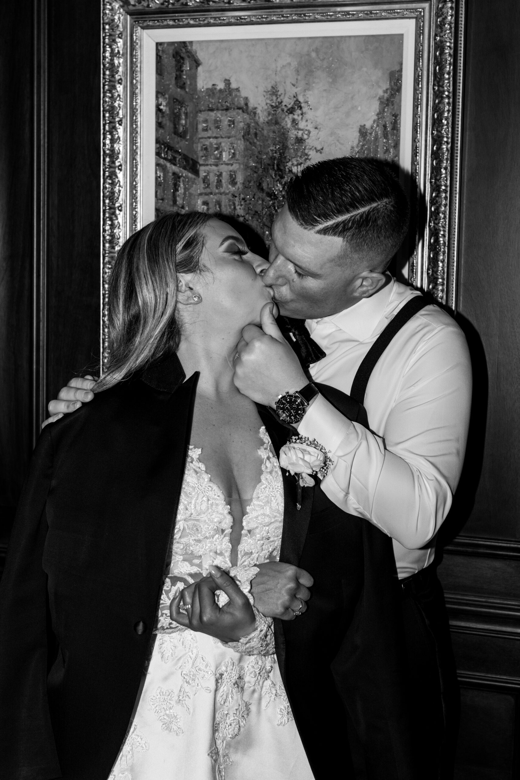 Timeless Park Chateau Wedding by Destination Film Wedding Photographer Katie Trauffer bride and groom kiss in dark library