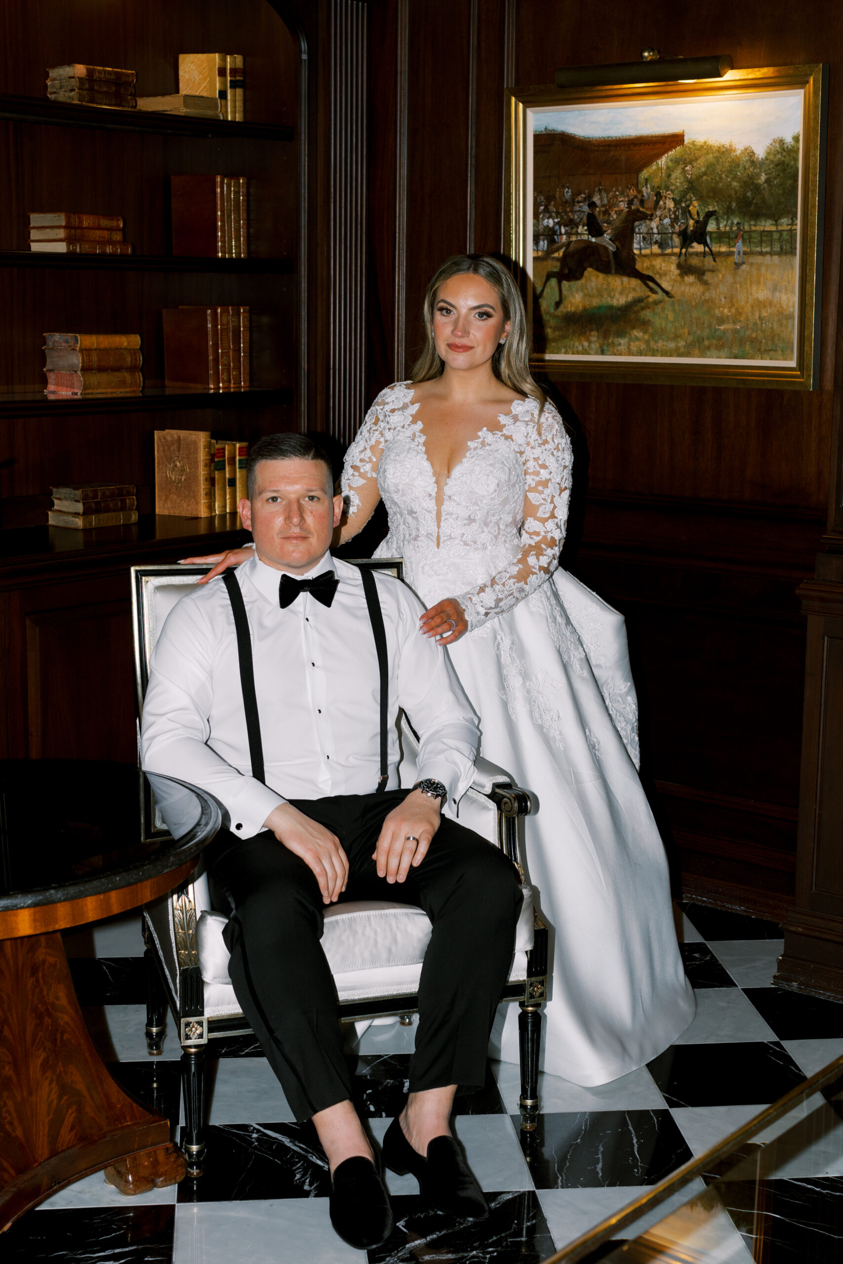 Timeless Park Chateau Wedding by Destination Film Wedding Photographer Katie Trauffer classic bride and groom portrait in dark library