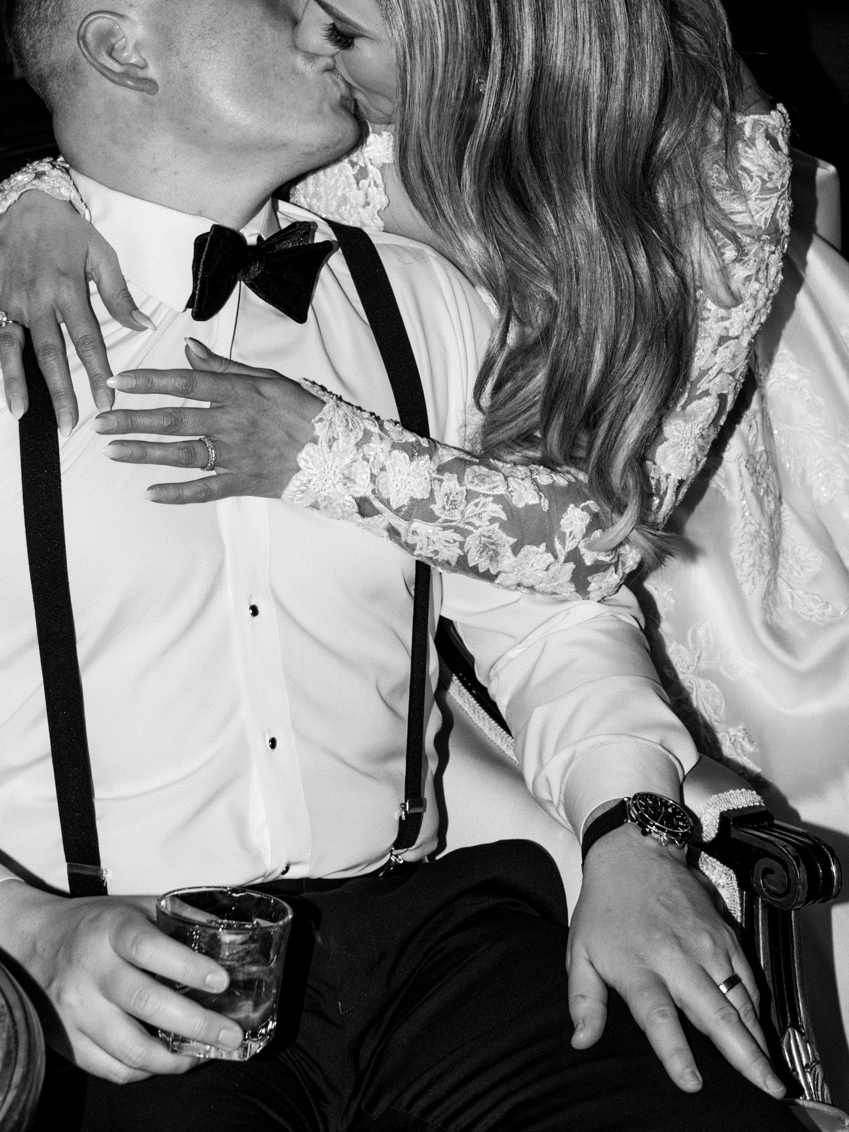 Timeless Park Chateau Wedding by Destination Film Wedding Photographer Katie Trauffer black and white close up of bride leaning down to kiss groom while he sits in chair