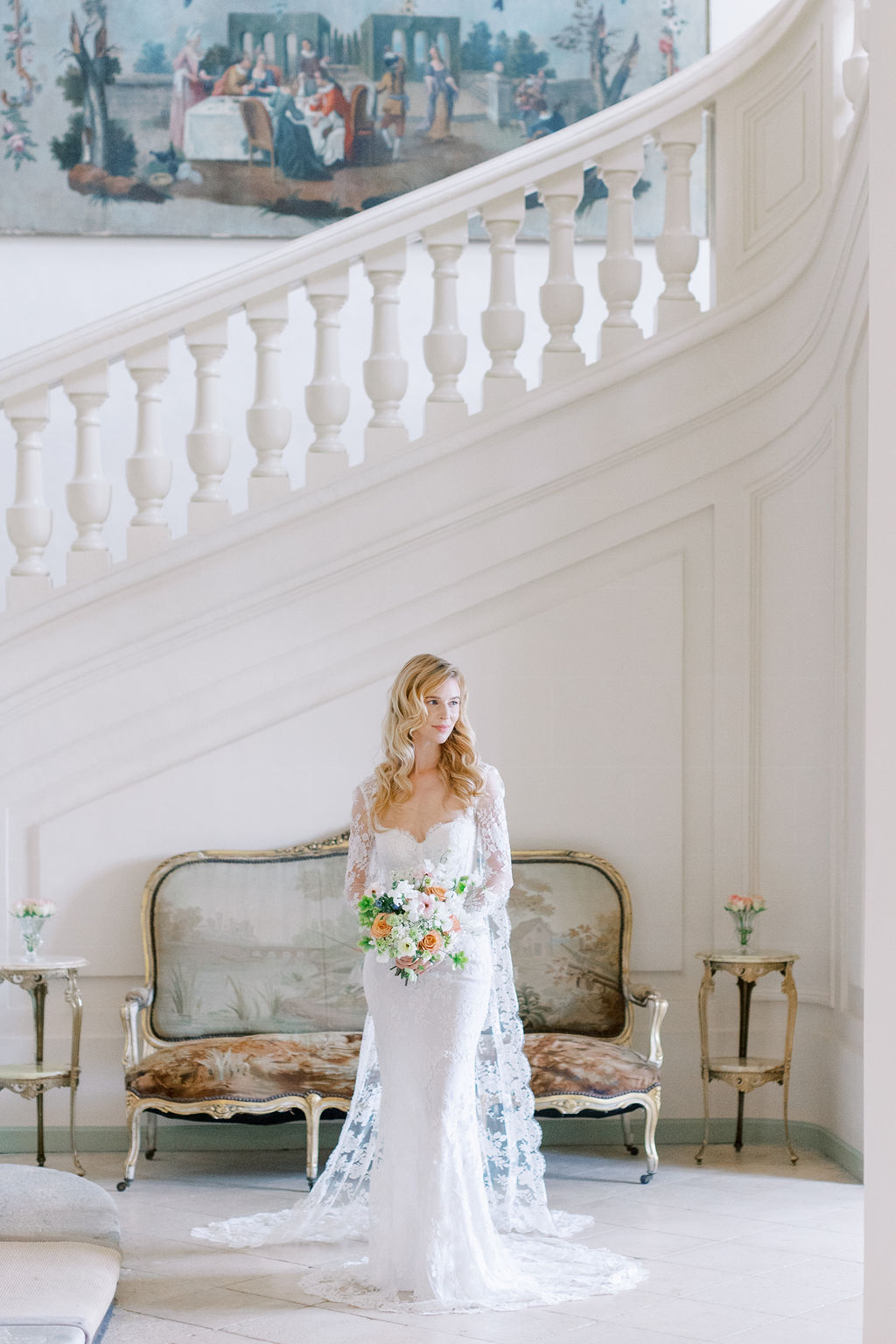 Bride at Chateau du Grand Luce grand staircase