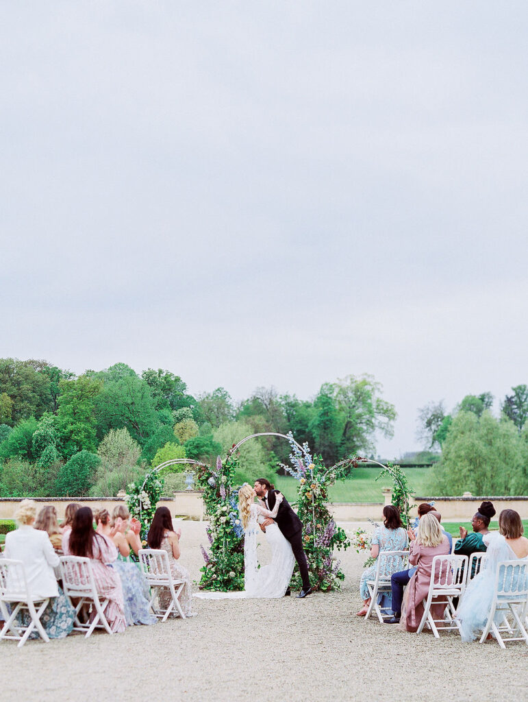 bride and groom kiss at Bride at Chateau du Grand Luce wedding ceremony