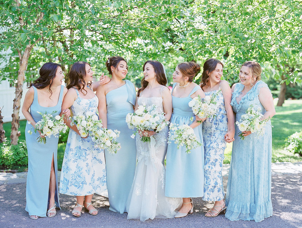 Ryland Inn Wedding Bride and Bridesmaids in Blue Gowns laughs together