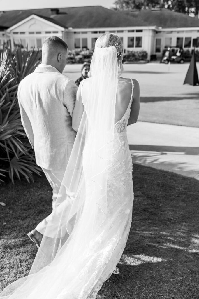 bride and groom walking out of ceremony together