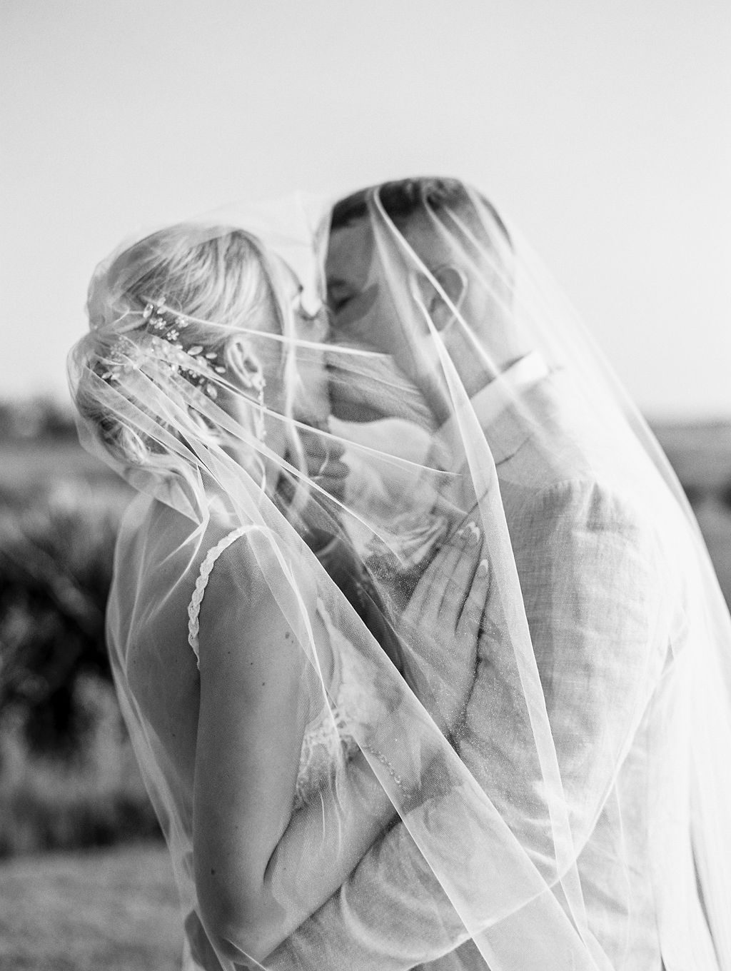 romantic kiss under veil at St Augustine Wedding 