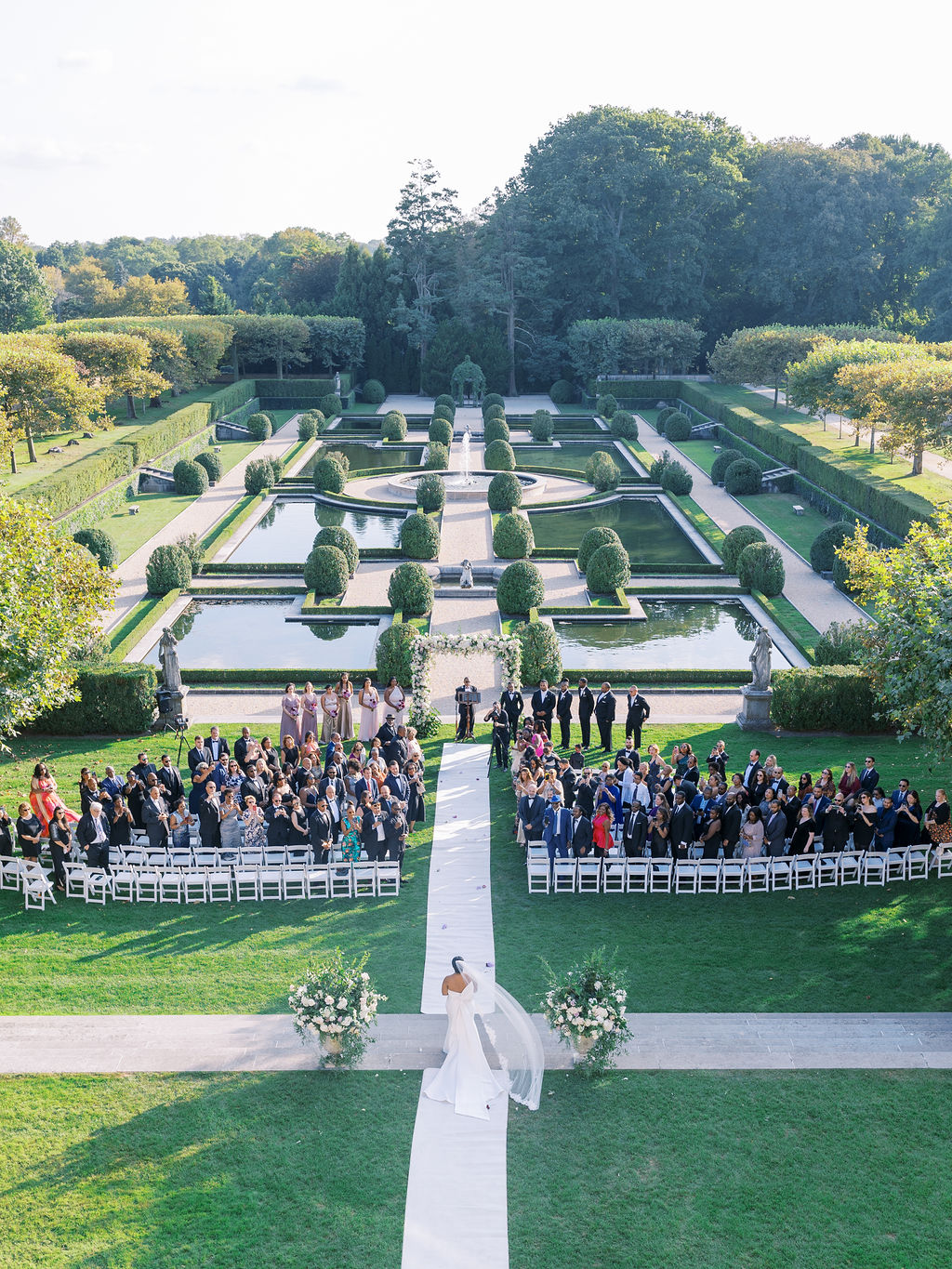 bride walks down aisle Oheka Castle Wedding Photography