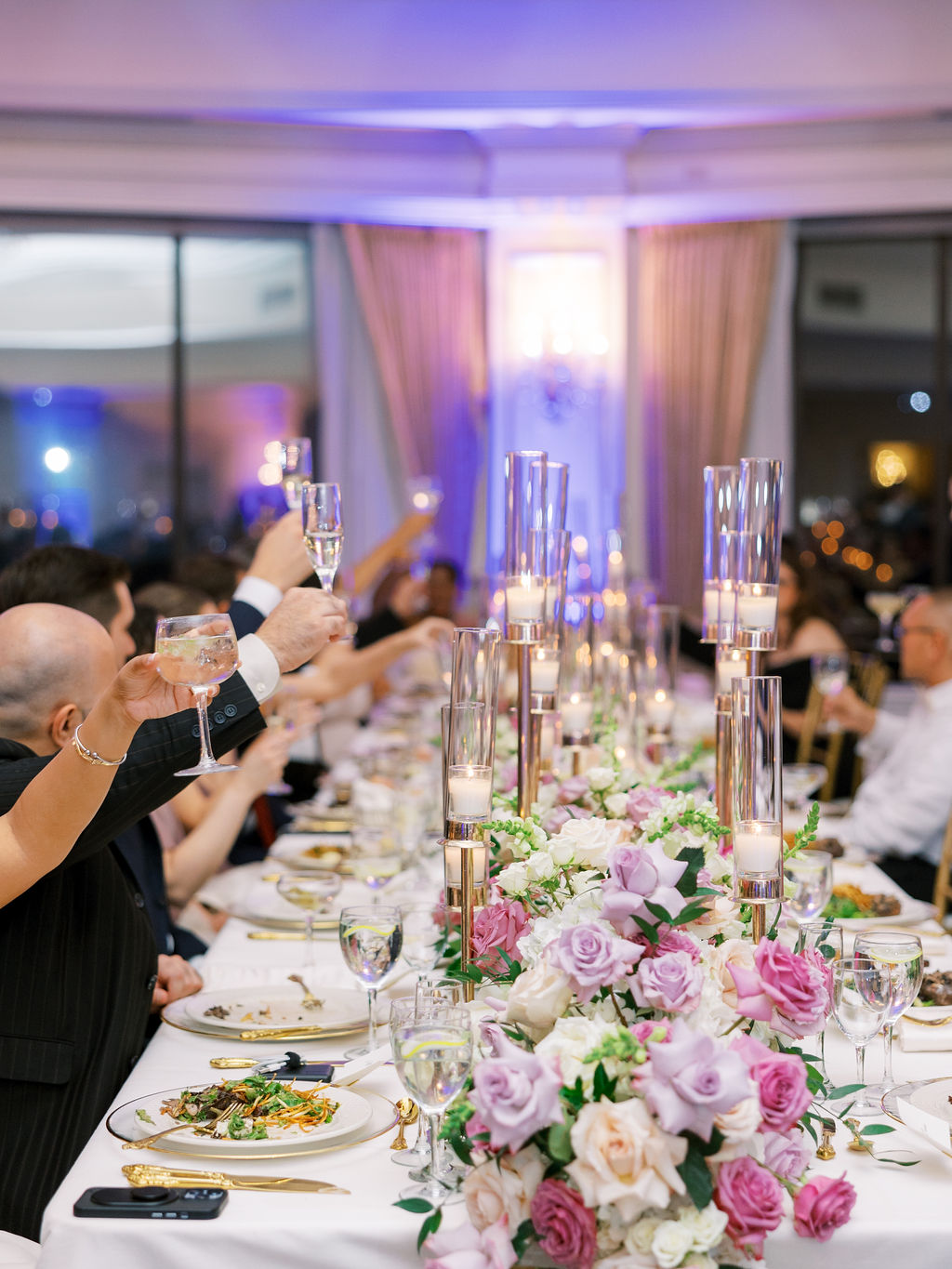 guests cheers at Oheka Castle Wedding reception