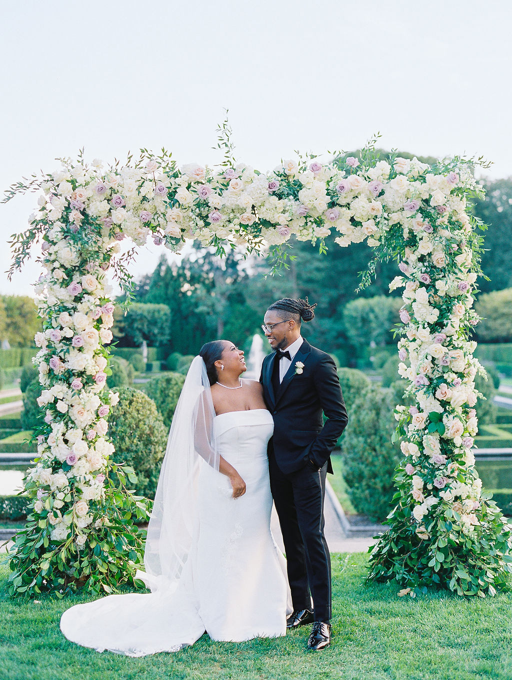 bride and groom in garden ceremony Oheka Castle Wedding Photography