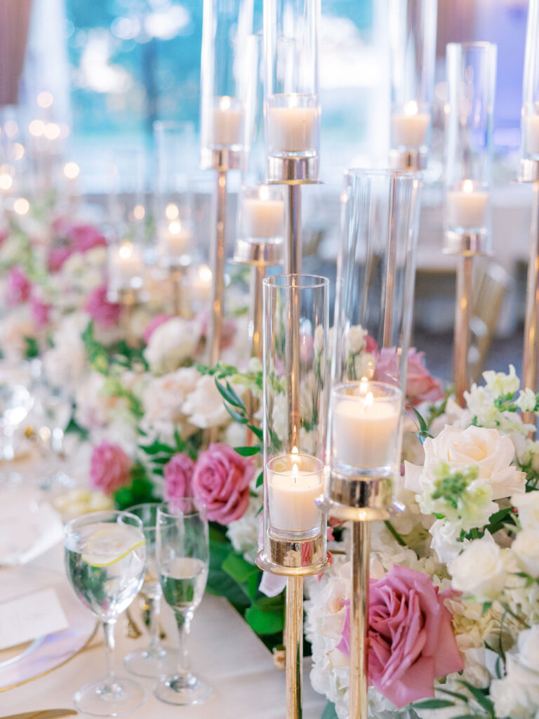 candles and roses at oheka wedding reception